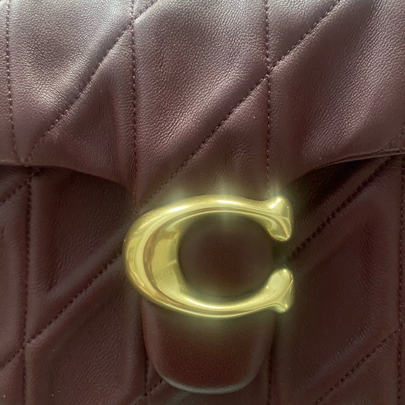 Coach Quilted Leather Bag in Burgundy with gold hardware
Tabby 16 - Picture 3 of 5